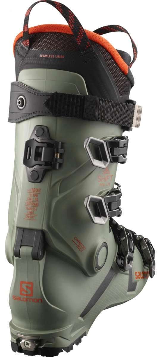 Salomon Shift Pro 130 AT Ski Boot 2022 - A black and orange ski boot with a textured pattern on the upper material.