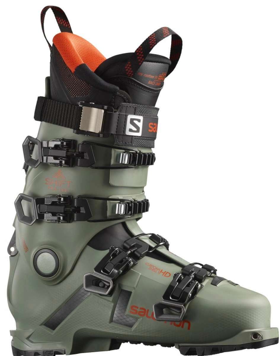 Salomon Shift Pro 130 AT Ski Boot 2022 - A green ski boot with a black strap and buckle on the side.