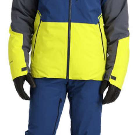 Spyder Vanqysh Insulated Jacket 2023 - A navy blue and yellow ski jacket with a zippered chest pocket, worn by a model on a plain background.