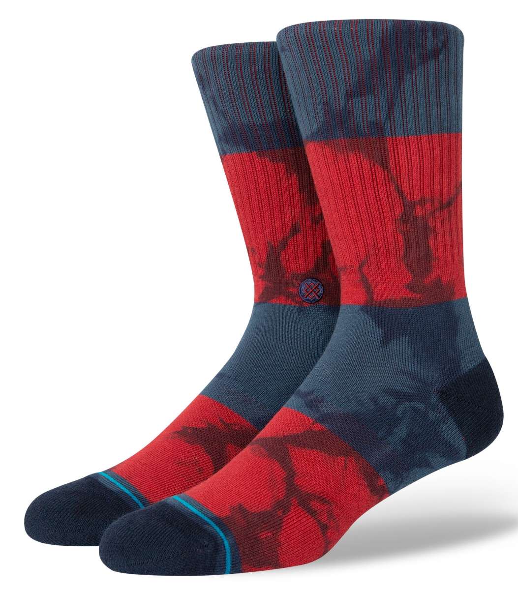 Stance Assurance Crew Cut Socks 2023 - A pair of red and navy crew socks with a repeating pattern of dark blue lines.