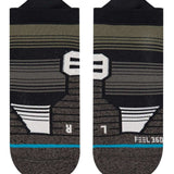 Stance Caliber Tab Low Cut Socks 2023 - Black socks with white stripes and a small logo on the top.