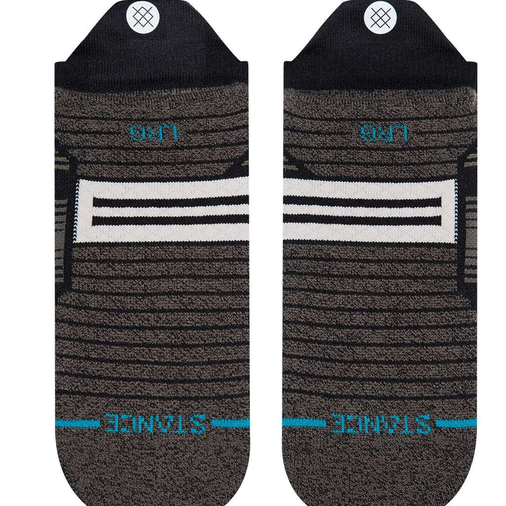 Stance Caliber Tab Low Cut Socks 2023 - Gray socks with a white logo and black tabs on top.