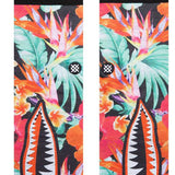 Stance Dorian Crew Cut Socks 2023 - A pair of crew cut socks with a tropical floral pattern in shades of pink, green, and orange on a black background.