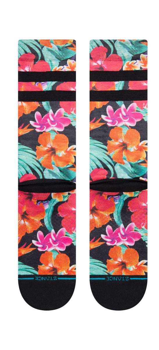 Stance Dorian Crew Cut Socks 2023 - A pair of crew cut socks with a tropical floral pattern in shades of pink, orange, and green on a black background.