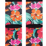 Stance Dorian Crew Cut Socks 2023 - A pair of crew cut socks with a tropical floral pattern in shades of pink, orange, and green on a black background.