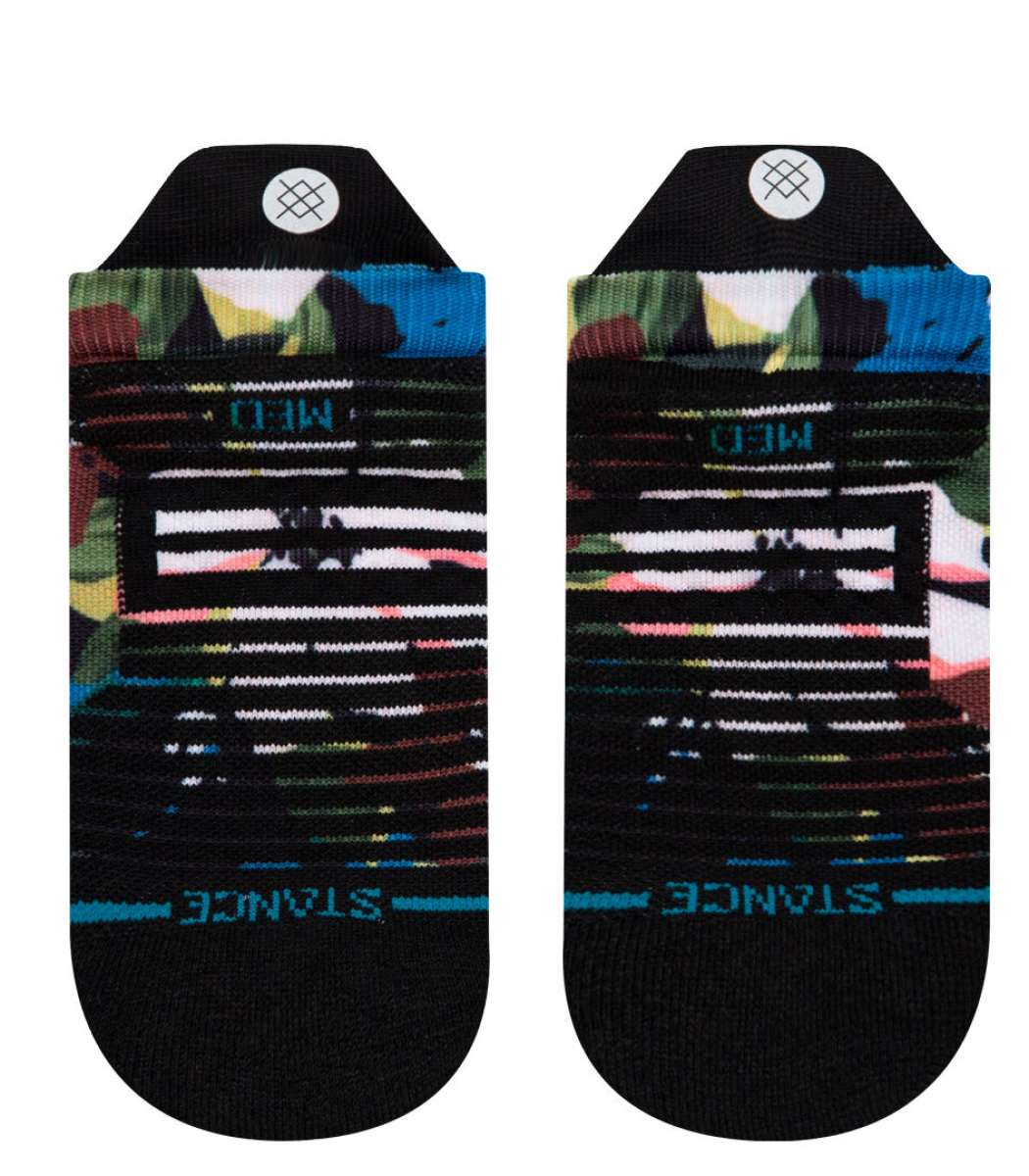 Stance Ladies Expanse Tab Low Cut Socks - A pair of low-cut socks with a multicolored abstract pattern featuring shades of pink, green, blue and yellow on a black background.