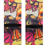 Stance Gooey Crew Socks 2023 - A pair of crew socks with a colorful, abstract design featuring pink, orange, yellow and green shapes on a black background.