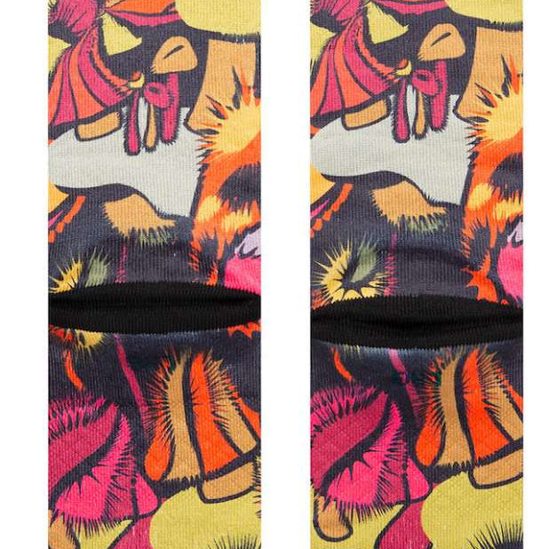Stance Gooey Crew Socks 2023 - A pair of crew socks with a colorful, abstract design featuring pink, orange, yellow and green shapes on a black background.