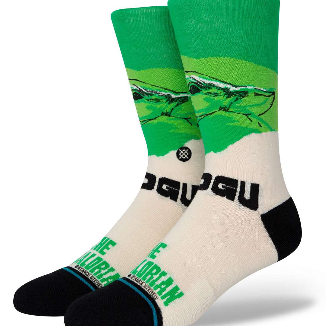 Stance Grogu West Crew Socks 2023 - Baby Yoda with green robes and hooded cloak on a tan background.