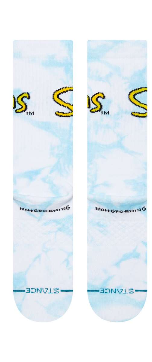 Stance - White socks with yellow logo on top of foot.