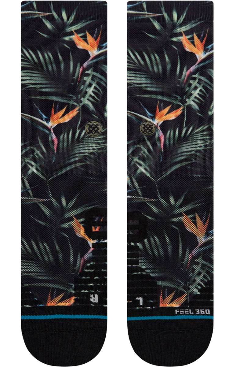 Stance Paradis Crew Socks 2023 - Black crew socks with a repeating pattern of palm leaves and orange flowers.