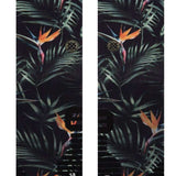 Stance Paradis Crew Socks 2023 - Black crew socks with a repeating pattern of palm leaves and orange flowers.