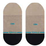 Stance Ladies' Show Some Skin 2023 - A pair of tan ankle socks with a small blue logo and a repeating pattern of thin white lines.