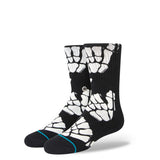 Stance Kids' Zombie Hang Crew Socks 2023 - Black and white socks with a zombie hand print design on the top portion.