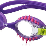 TYR Swimple Spikes Youth Swim Goggles - A pair of purple swim goggles with neon green nose pieces and pink spikes along the top frame.