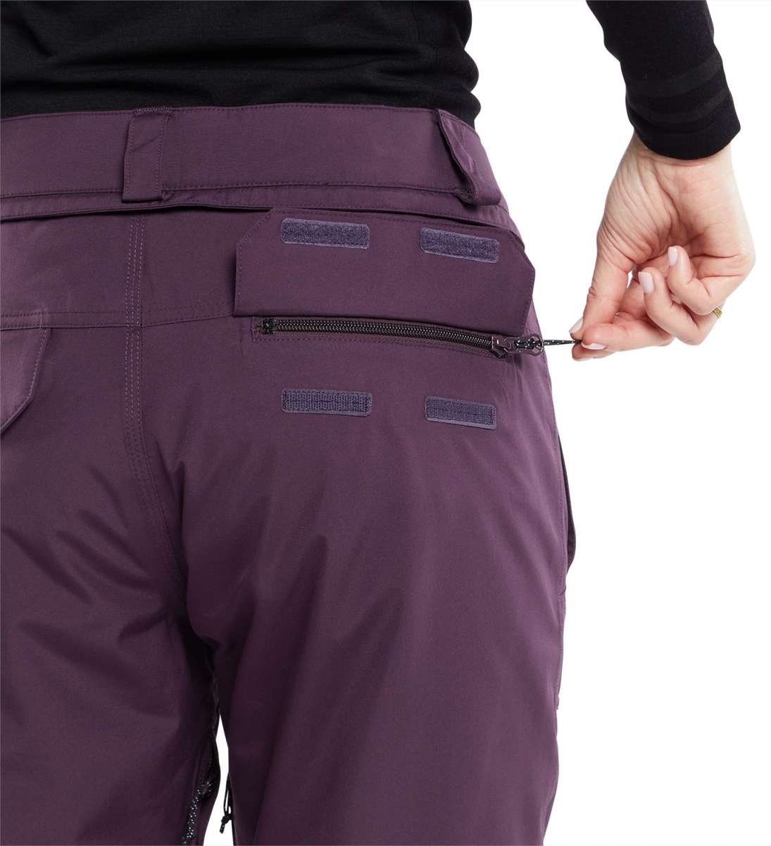 Volcom Women's Knox Insulated GORE-TEX Pant - A pair of purple ski pants with a zippered pocket on the back and a black zipper pull.