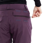 Volcom Women's Knox Insulated GORE-TEX Pant - A pair of purple ski pants with a zippered pocket on the back and a black zipper pull.