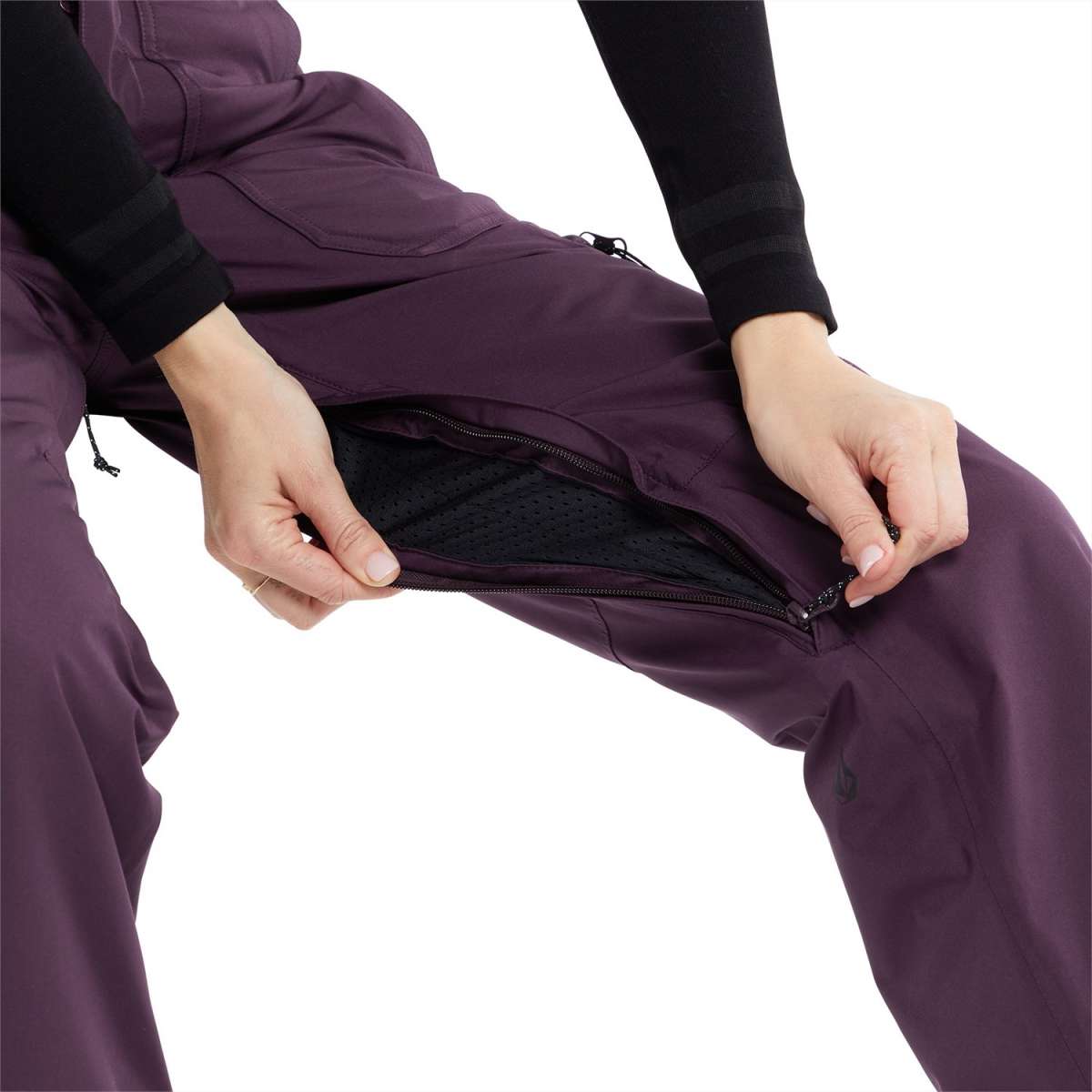 Volcom Women's Knox Insulated GORE-TEX Pant - A pair of purple snow pants with a zippered pocket on the side and a black zipper pull.