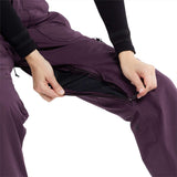 Volcom Women's Knox Insulated GORE-TEX Pant - A pair of purple snow pants with a zippered pocket on the side and a black zipper pull.