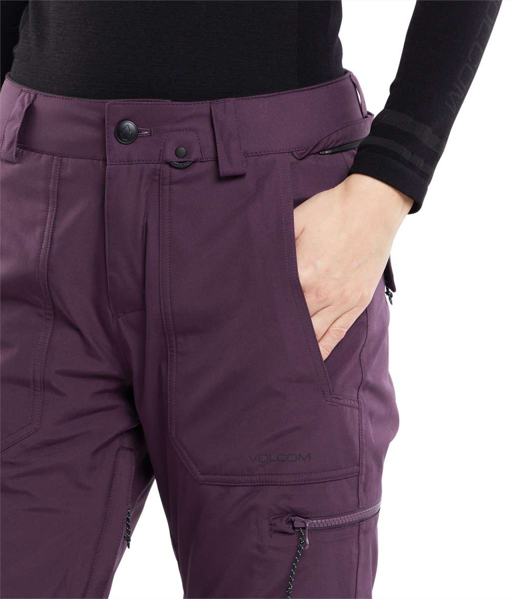 Volcom Women's Knox Insulated GORE-TEX Pant - A pair of purple ski pants with a black zipper on the left thigh and a black logo that reads "VOLCOM" in white letters.