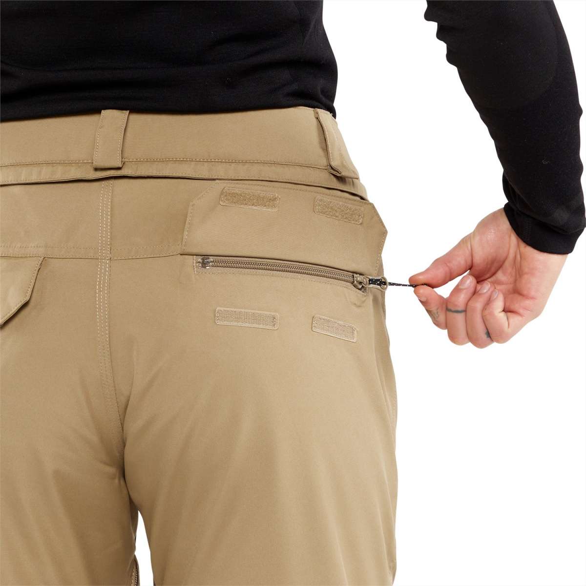 Volcom Women's Knox Insulated GORE-TEX Pant - A pair of khaki-colored pants with a zipper on the back pocket.