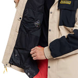 Volcom Longo GORE-TEX Shell Jacket 2024 - A black and tan jacket with a yellow logo on the chest, featuring a zipper closure.