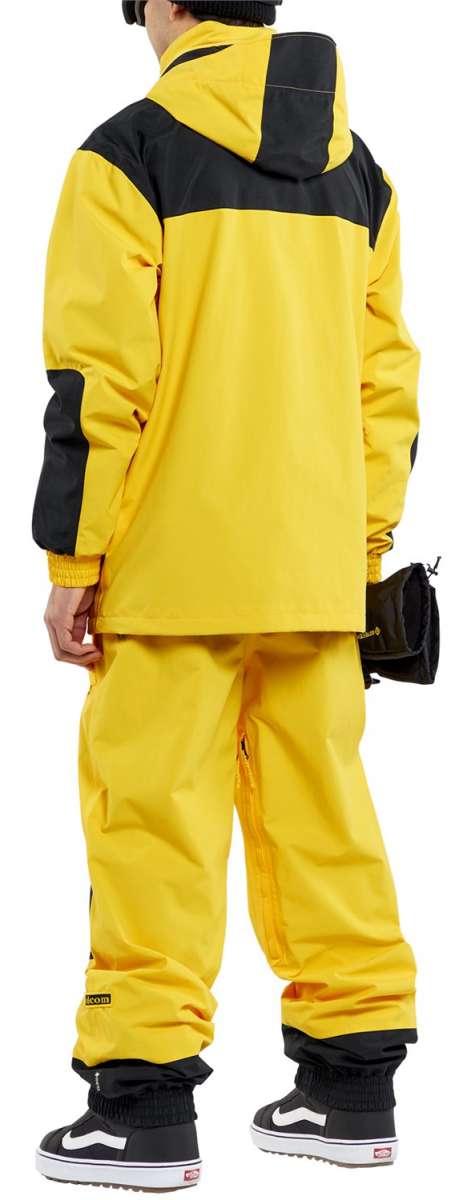 Volcom Longo GORE-TEX Shell Jacket - A bright yellow jacket with black accents and a hood, featuring a zippered chest pocket on the left side.