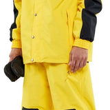 Volcom Longo GORE-TEX Shell Jacket 2024 - A bright yellow jacket with black accents and a hood, featuring silver snap buttons.