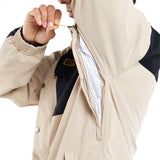 Volcom Longo GORE-TEX Shell Jacket 2024 - A tan jacket with a black logo on the chest and silver snaps down the front.