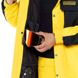 Volcom Longo GORE-TEX Shell Jacket 2024 - A black and yellow jacket with a zippered chest pocket, featuring a Volcom logo patch on the left side of the chest.