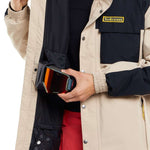Volcom Longo GORE-TEX Shell Jacket 2024 - A black jacket with a yellow logo on the left chest and silver snap buttons down the front.