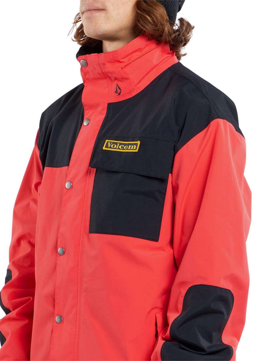 Volcom Longo GORE-TEX Shell Jacket 2024 - A black and red jacket with a yellow logo on the chest, featuring two zippered pockets and adjustable cuffs.