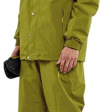 Volcom Longo GORE-TEX Shell Jacket - A green jacket with a hood and two chest pockets, featuring a black zipper and silver snap buttons.