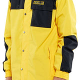 Volcom Longo GORE-TEX Shell Jacket 2024 - A black and yellow jacket with a hood, featuring a zippered chest pocket and adjustable cuffs.