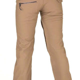 Volcom Women's Species Stretch Pant 2022 - Tan pants with a zippered pocket on the back right side.