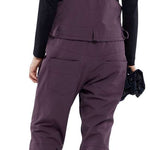 Volcom Women's Swift Bib Overall Pant - A pair of bib overalls in a solid black color with adjustable straps and multiple pockets.