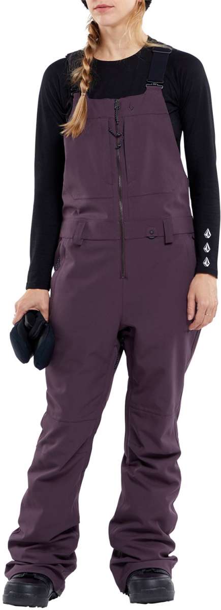 Volcom Women's Swift Bib Overall Pant - A pair of purple snow pants with a bib design and adjustable straps.