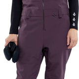 Volcom Women's Swift Bib Overall Pant - A pair of purple snow pants with a bib design and adjustable straps.