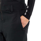Volcom Women's Swift Bib Overall Pant 2024 - Black bib overalls with white logo on left thigh and black zipper fly.