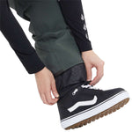 Volcom Women's Swift Bib Overall Pant 2024 - Black bib overalls with white logo on left thigh and black zipper fly.