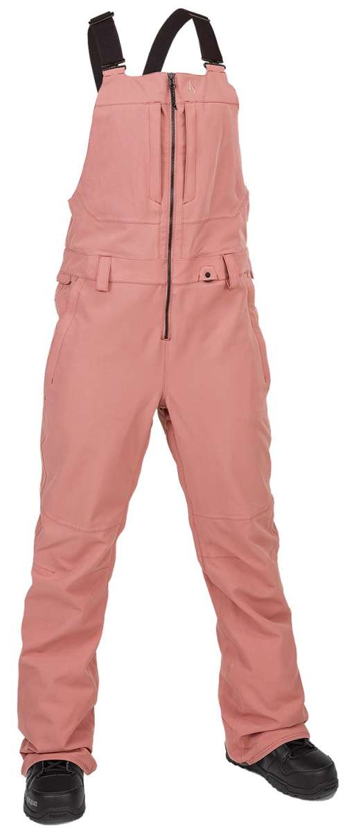 Volcom Women's Swift Bib Overall Pant 2024 - A dusty rose bib overall pant with a zippered front and adjustable straps.