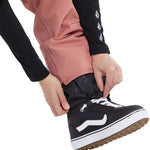 Volcom Women's Swift Bib Overall Pant - Black bib overalls with a subtle pattern of small, light-colored flowers on dark background.