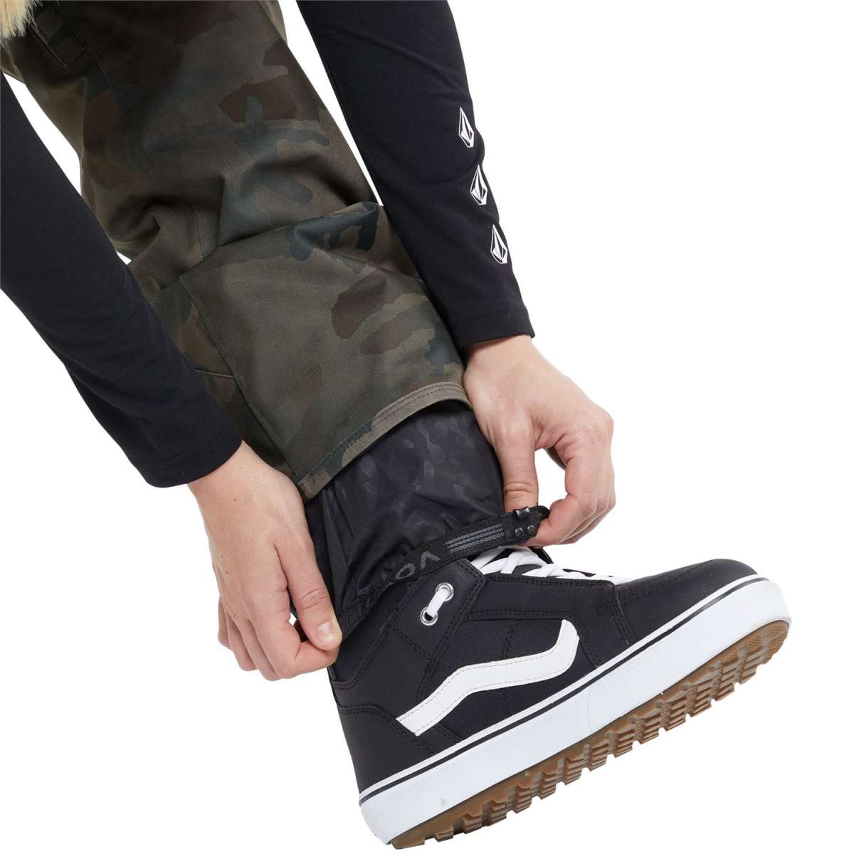 Volcom Women's Swift Bib Overall Pant - A pair of black bib overalls with a subtle white pattern on the fabric.