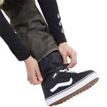 Volcom Women's Swift Bib Overall Pant - A pair of black bib overalls with a subtle white pattern on the fabric.