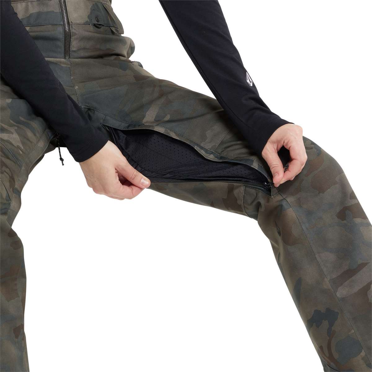 Volcom Women's Swift Bib Overall Pant 2024 - Black bib overalls with a white logo on the left thigh and black straps.