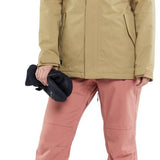 Volcom Women's Swift Bib Overall Pant - Black bib with white logo on left thigh and black zippered pocket on right side.