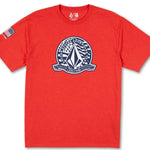 Volcom - A red t-shirt with a white logo featuring an upside-down black triangle and the words "US ST" in small letters above it.