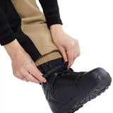 Volcom Women's Wilding Shell Pants 2024 - Black pants with tan stripe down side.