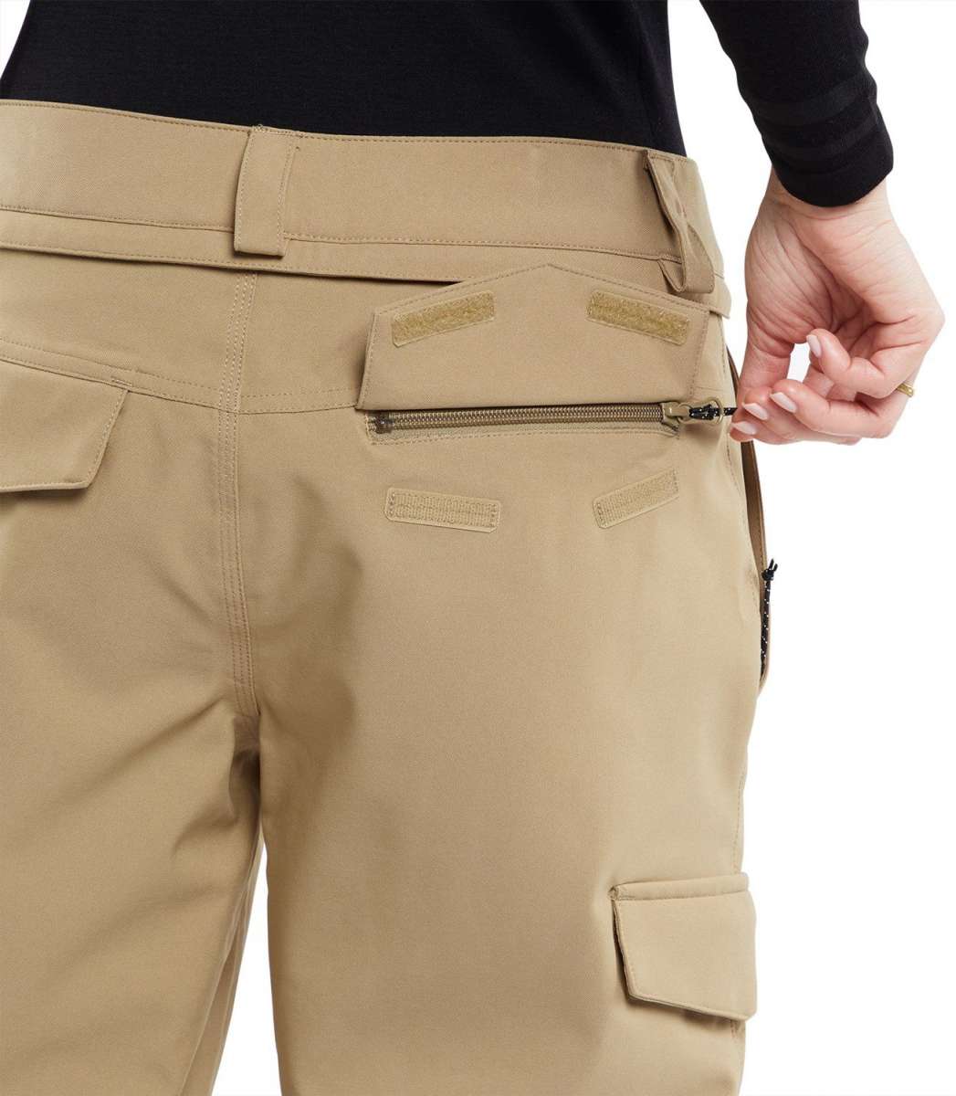 Volcom Women's Wilding Shell Pants 2024 - Beige pants with a zippered pocket on the back right side.