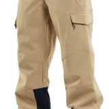 Volcom Women's Wilding Shell Pants 2024 - Beige pants with a black stripe down the side and zippered pockets on the thigh.